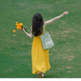 Dopamine Yellow Sleeveless Dress Woman 2026 Summer French Seaside Holiday Super Fairy Beach Skirt