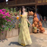 2025 Summer New Bag Of Hip Fish Tail Long Dress Yellow Broken Flowers V-Neck French Printing Temperament Slim Slimming Dress
